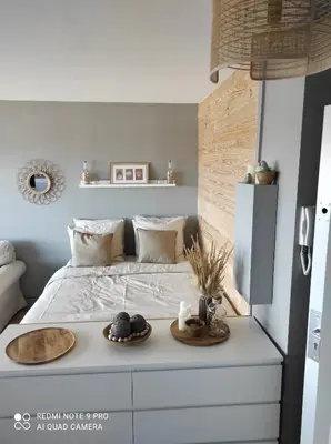 Un ou plusieurs lits dans un hébergement de l'établissement appartement belle vue