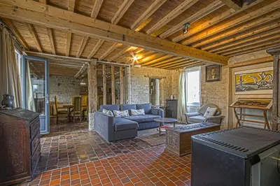Coin salon dans l'établissement LA MAISON DE CASSANDRE jardin & parking privé