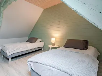 Un ou plusieurs lits dans un hébergement de l'établissement Holiday Home La peite maison by Interhome