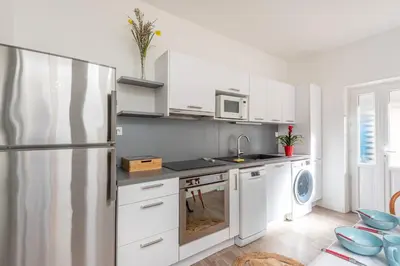 Cuisine ou kitchenette dans l'établissement La Jonquille