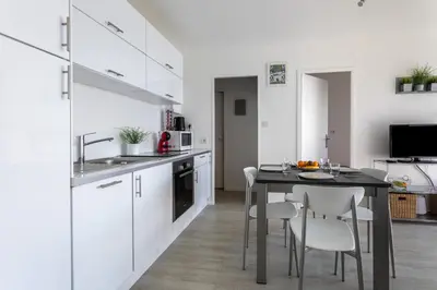 Cuisine ou kitchenette dans l'établissement Le P'tit Idéal