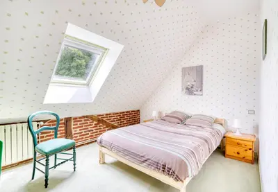 Un ou plusieurs lits dans un hébergement de l'établissement Nunki, Maison de campagne avec grand jardin