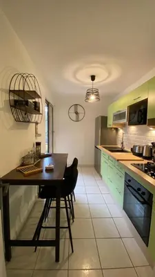 Cuisine ou kitchenette dans l'établissement Location appartement F2 à Caen My precious Home F2 à Caen