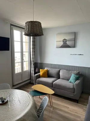 Coin salon dans l'établissement Superbe appartement front de mer