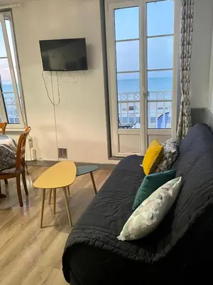 Coin salon dans l'établissement Superbe appartement front de mer