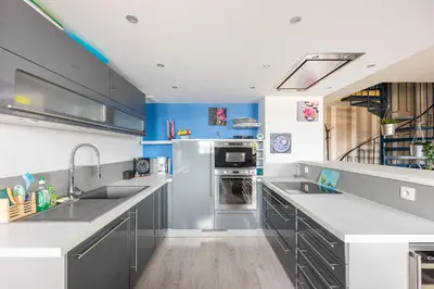 Cuisine ou kitchenette dans l'établissement Le Cockpit