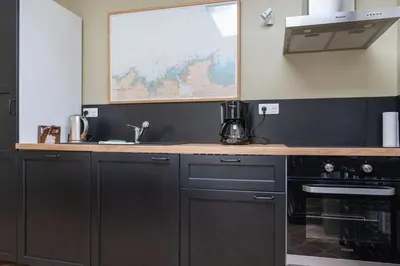 Cuisine ou kitchenette dans l'établissement Gîte Rogonde