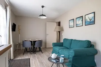 Coin salon dans l'établissement Gîte Taumain