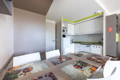 Cuisine ou kitchenette dans l'établissement Courlis Cendré