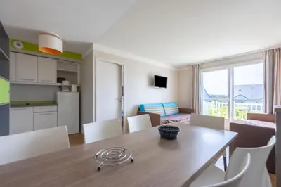 Cuisine ou kitchenette dans l'établissement Les Ondines