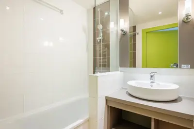 Salle de bains dans l'établissement Les Ondines