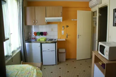 Cuisine ou kitchenette dans l'établissement Au Coeur de Bourg CSM