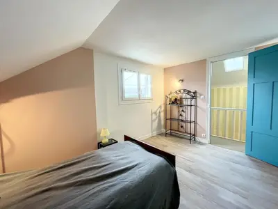 Un ou plusieurs lits dans un hébergement de l'établissement Villa proche Plage et Centre, Jardin Clos, Wifi, Chien possible - FR-1-361-431