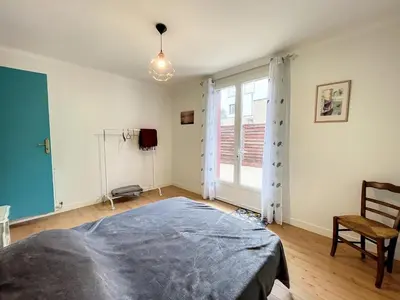 Un ou plusieurs lits dans un hébergement de l'établissement Villa proche Plage et Centre, Jardin Clos, Wifi, Chien possible - FR-1-361-431