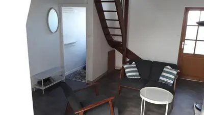 Coin salon dans l'établissement La p'tite maison de la plage