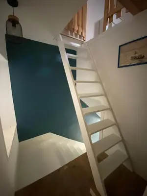 Un ou plusieurs lits dans un hébergement de l'établissement Authentique maison de pêcheur à Port-en-Bessin