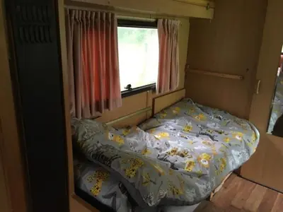 Un ou plusieurs lits dans un hébergement de l'établissement Inviting 2-Bed Cabin in Domfront En Poiraie