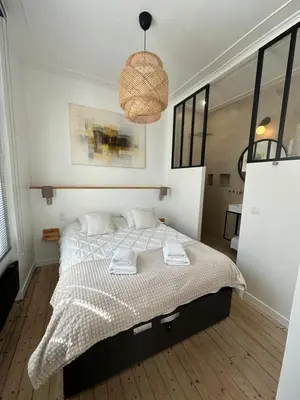 Un ou plusieurs lits dans un hébergement de l'établissement La Nacre - Logement de charme - Cabourg