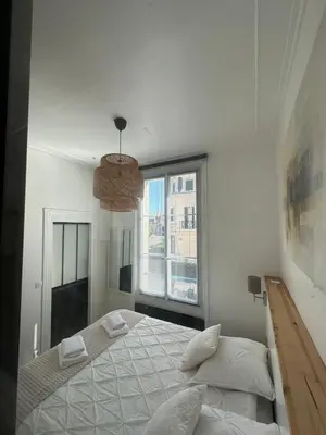 Un ou plusieurs lits dans un hébergement de l'établissement La Nacre - Logement de charme - Cabourg