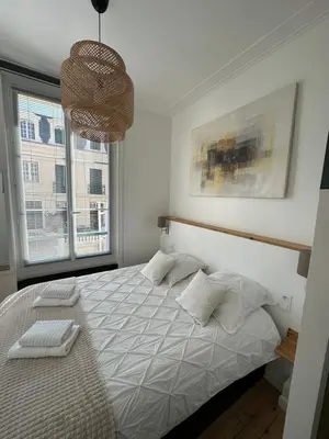 Un ou plusieurs lits dans un hébergement de l'établissement La Nacre - Logement de charme - Cabourg