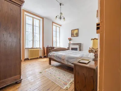 Un ou plusieurs lits dans un hébergement de l'établissement Normandy Fireplace Retreat