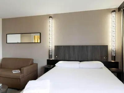 Un ou plusieurs lits dans un hébergement de l'établissement ibis Styles Flers
