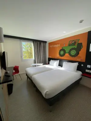 Un ou plusieurs lits dans un hébergement de l'établissement ibis Styles Flers