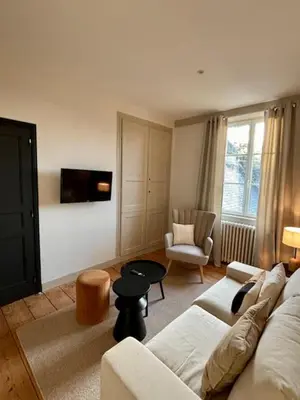 Coin salon dans l'établissement La suite