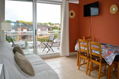 Coin salon dans l'établissement Appartement au pied de la plage - Balcon - Parking