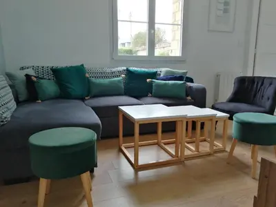 Coin salon dans l'établissement Maison cosy en plein coeur de Ouistreham