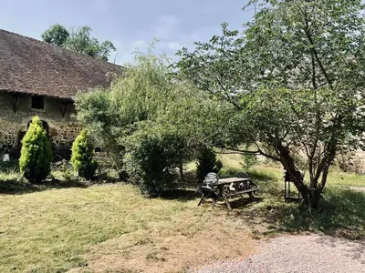 Jardin de l'établissement Gite nadège à l Ombre d'une Tour