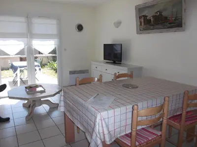 Télévision ou salle de divertissement dans l'établissement résidence Etoile de mer