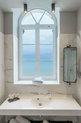 Salle de bains dans l'établissement Hotel de la Plage