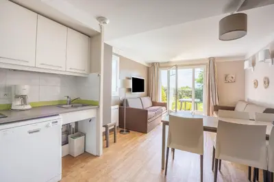Cuisine ou kitchenette dans l'établissement Hibou des marais