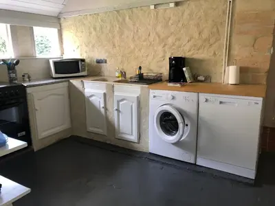 Cuisine ou kitchenette dans l'établissement L étable