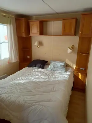 Un ou plusieurs lits dans un hébergement de l'établissement mobilhome nature