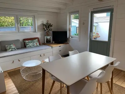 Télévision ou salle de divertissement dans l'établissement Cottage Le Cerf-volant