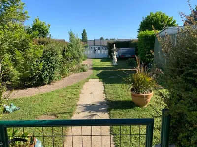 Jardin de l'établissement Résidence Les jardins de Courseulles F3
