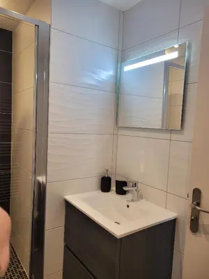 Salle de bains dans l'établissement La Mosloise