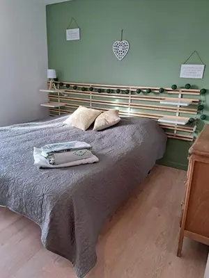Un ou plusieurs lits dans un hébergement de l'établissement Gite des falaises de Longues 8personnes