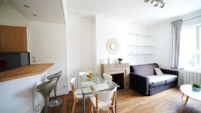 Coin salon dans l'établissement Caen: F2 Cosy au cœur du centre ville