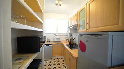 Cuisine ou kitchenette dans l'établissement Caen: F2 Cosy au cœur du centre ville