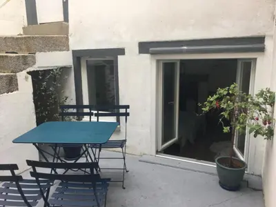 Balcon ou terrasse dans l'établissement MAISONNETTE de charme avec cour privative Haute-Ville GRANVILLE