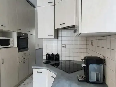 Cuisine ou kitchenette dans l'établissement Appartement au n°1 centre d'Avranches