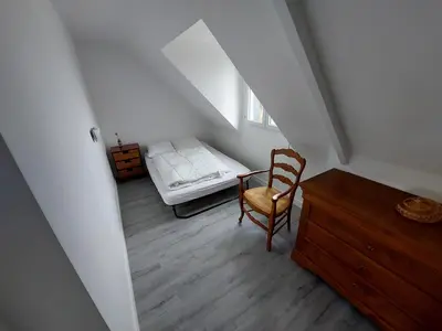Un ou plusieurs lits dans un hébergement de l'établissement Grande maison de 4 chambres, 9 couchages proche du Mont Saint Michel