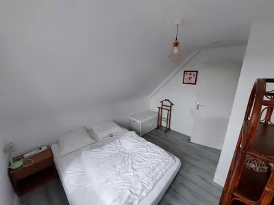 Un ou plusieurs lits dans un hébergement de l'établissement Grande maison de 4 chambres, 9 couchages proche du Mont Saint Michel