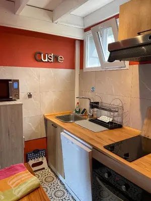 Cuisine ou kitchenette dans l'établissement La Boussole centre station proche mer