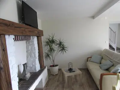 Télévision ou salle de divertissement dans l'établissement Gîte T'ché Dédée