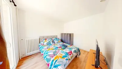 Un ou plusieurs lits dans un hébergement de l'établissement Superbe appartement au cœur du centre ville