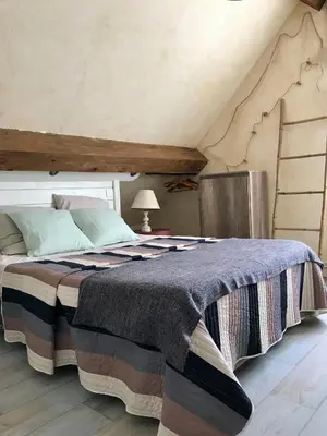 Un ou plusieurs lits dans un hébergement de l'établissement Chambres d'Hôtes Lefoulon